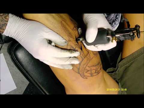 Tattoo of traditional style native American bull design.