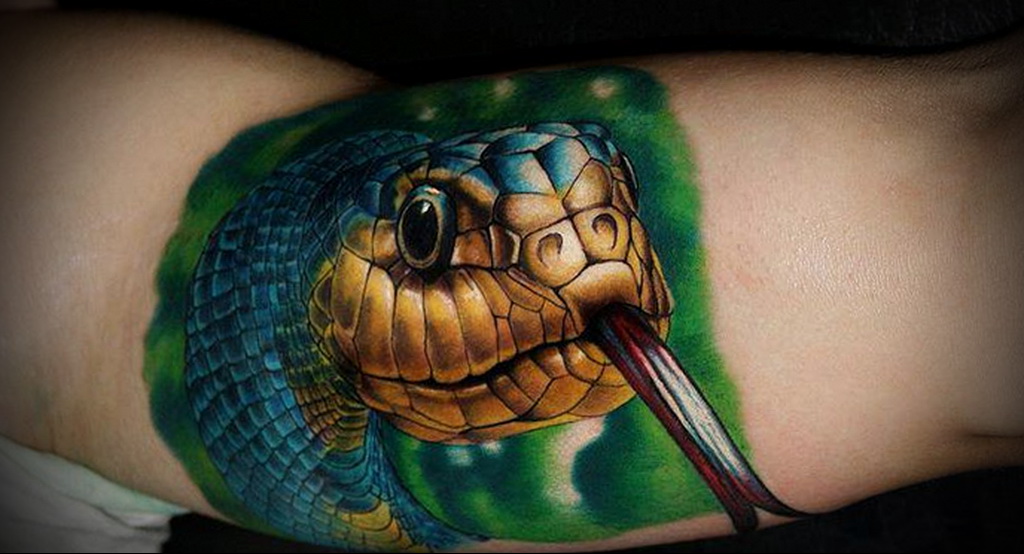 Значение татуировки змея. 
