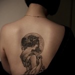 tattoo between the shoulder blades girls