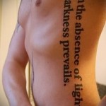 tattoo on the side of men's inscriptions