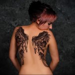 tattoo wings on the blades