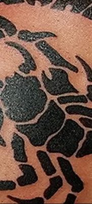Значение татуировки скорпион 7
