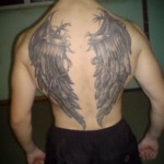 Мужская тату с крыльями на спину