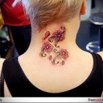 аккуратные цветочки - татуировка на шее женская - фото