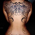 большие необычные крылья тату на спине женская
