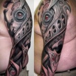 классная биомеханика в тату - мужская татуировка на плече
