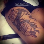 крупная татуировка с лицом девушки на ногу - стиль олд скул