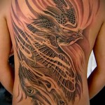 огненная птица феникс татуировка на спине мужская фото