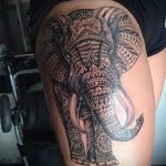 слон с узорами на ногу для девушки тату