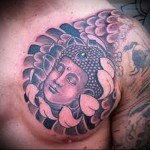 тату голова Будды - мужская татуировка на грудь