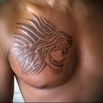 тату оскал льва линиями - мужская татуировка на грудь
