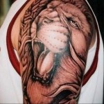 тату рычание льва - мужская татуировка на плече