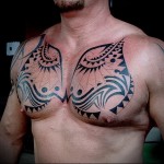 тату симметричные маори узоры - мужская татуировка на грудь