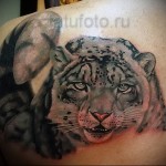 татуировка как картина маслом с рисунком леопарда