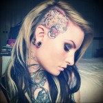 татуировка леопард на голове девушки