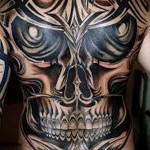 улыбка смерти - татуировка на спине мужская фото