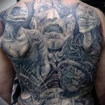 уродливые лица - татуировка на спине мужская фото
