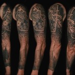 черный рукав тату - мужская татуировка на плече