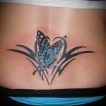 butterfly tattoo on the lower back