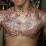 Татуировки на грудной клетке мужские 14