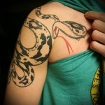 snake tattoo on shoulder