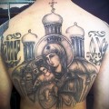 дева и младенец на фоне церкви с куполами - татуировка