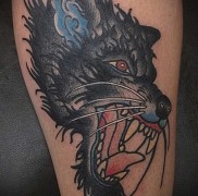 что значат татуировки с оскалом волка — фото