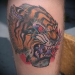 тату голова тигра - олд скул татуировка на ноге