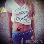 тату ласточки на животе - фото пример 26