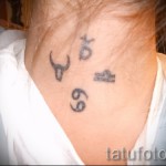 Capricorn tattoo on his neck - Photo example of 18122015№ 1
