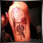 Dreamcatcher tattoo on his arm - Photo example of the number 11122014 4