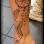 Dreamcatcher tattoo on his leg - Photo example of the number 11122014 3