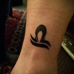 Libra tattoo on his arm - Photo example of the number 13122015 2