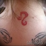 Libra tattoo on his neck - Photo example of the number 13122015 1