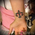 Libra tattoo on the wrist - Photo example of the number 13122015 2