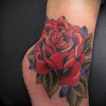 Rose tattoo on his ankle - an example in the photo 2