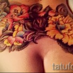 flower tattoo on the back - Picture option from the number 21122015 2