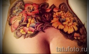 flower tattoo on the back - Picture option from the number 21122015 2