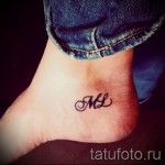 inscription tattoo on his ankle - an example in the photo 1
