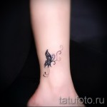 small tattoo on his ankle - an example of the photo 1