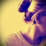 swallow tattoo behind the ear - Photo example 2