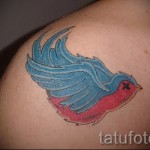 swallow tattoo on her collarbone - Photo example 2