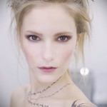 swallow tattoo on her collarbone - Photo example 3