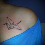 swallow tattoo on her collarbone - Photo example 5