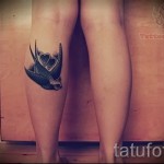 swallow tattoo on his leg 2