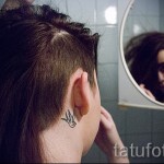 swallow tattoo on his neck - Photo example 5