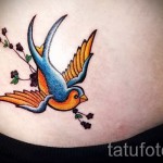 swallow tattoo on his stomach - an example of the photo 7