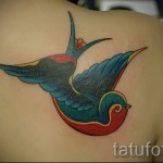 swallow tattoo on the blade - Photo example 4