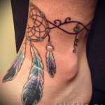 tattoo bracelet on his ankle - an example in the photo 3