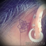 tattoo flower behind the ear 2